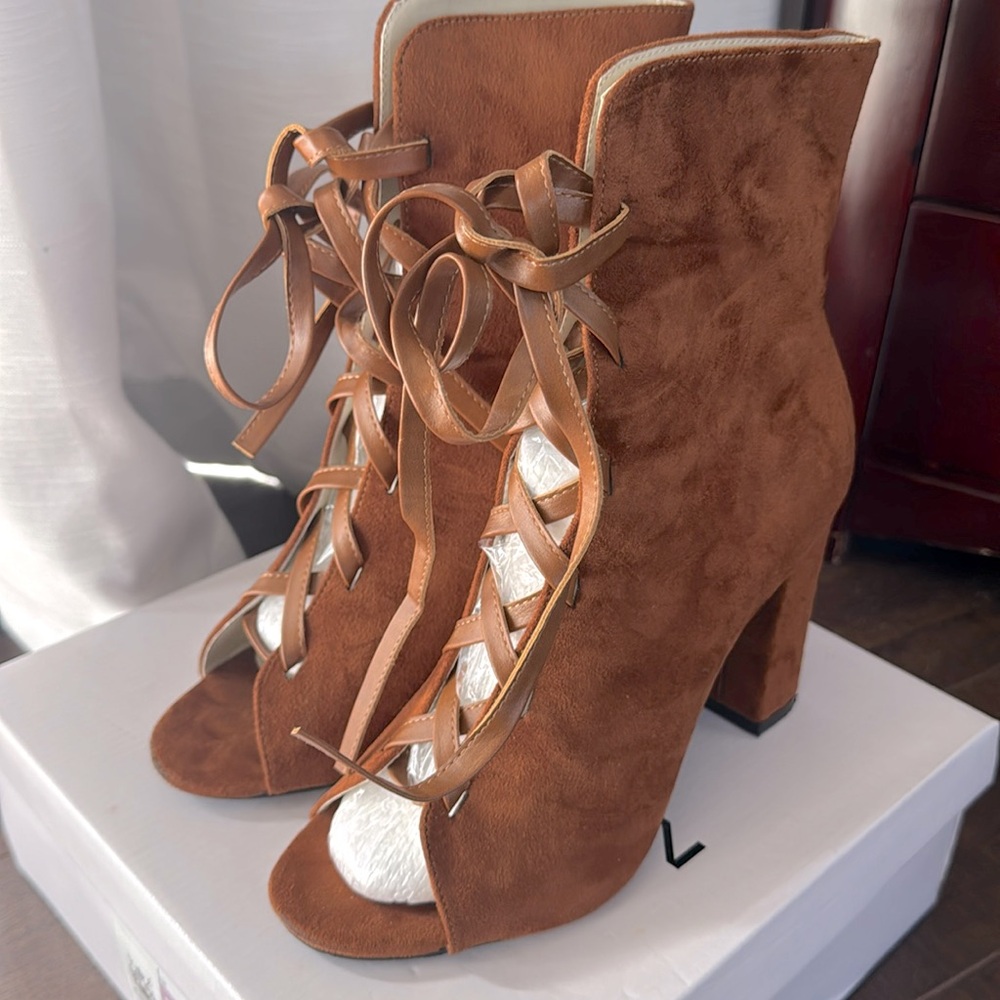 New with box beautiful faux suede lace up booties!! Rusty Brown